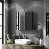 A modern bathroom vanity with a sink, faucet, and a mirrored cabinet. Produktbild-Vorschau