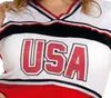 Close-up of a person wearing a white, red, and black cheerleader top with "USA" printed on it. Produktbild-Vorschau