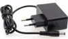 A black power adapter with a European plug and a DC output connector. Produktbild-Vorschau