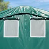 Close-up view of two windows on a green tent or shelter. Voir les images du produit
