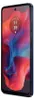 A close-up side view of a dark blue smartphone with a colorful abstract wallpaper on its screen. Náhled obrázku produktu