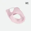 A pink baby toilet seat on a light gray background. Produktbild-Vorschau