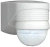 A white motion sensor mounted on a wall. Produktbild-Vorschau