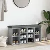 A shoe bench with storage compartments and a padded top in a room setting. Náhled obrázku produktu