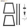 The image displays components of a table leg set, including two trapezoidal frames, two vertical supports, screws, an Allen wrench, and adjustable feet. Produktbild-Vorschau