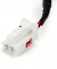A close-up of a white electrical connector with a red and black wire attached. Anteprima dell’immagine prodotto