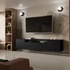 A modern living room with a wall-mounted TV and entertainment unit. Produktbild-Vorschau