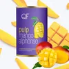 A can of mango pulp surrounded by mango slices and whole mangoes. Náhľad obrázku produktu