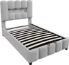 A light gray upholstered bed frame with a slatted mattress base, shown from a diagonal angle. Náhled obrázku produktu