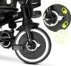 Close-up of a black tricycle's front wheel and frame, with inset diagrams highlighting features. Produktbild-Vorschau