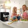 A mother and daughter in a kitchen, with an air fryer on the counter. The mother is cutting vegetables, and the daughter is watching. Náhled obrázku produktu