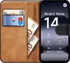 A book-style phone case with cards and money inside, next to a smartphone displaying product information. Produktbild-Vorschau