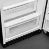 Close-up view of the interior of a black SMEG refrigerator, showing two drawers with transparent fronts and handles. Produktbild-Vorschau