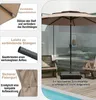 A patio umbrella set up on a wooden deck next to a swimming pool. Podgląd zdjęcia produktu