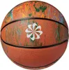 A basketball with a colorful, abstract pattern and a white Nike logo. Produktbild-Vorschau