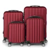 Four red suitcases of varying sizes are arranged in a group against a white background. Náhled obrázku produktu