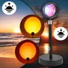 A collage of images showing a sunset lamp projecting light, with a beach and sunset in the background. Podgląd zdjęcia produktu