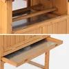 Close-up view of the interior of a wooden chicken coop, showing a pull-out tray and roosting bars. Anteprima dell’immagine prodotto