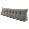 A long, gray, tufted wedge pillow is shown against a white background. Produktbild-Vorschau