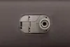 Close-up of a lock mechanism on a gray surface. Produktbild-Vorschau