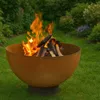 A fire pit with burning logs in a garden setting. Náhľad obrázku produktu