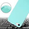 A close-up of a turquoise phone case, showing a detail of its edge and the camera cutout. The background is a stylized brick pattern. Náhled obrázku produktu