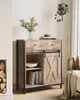 A wooden cabinet with black metal accents in a room setting. Náhled obrázku produktu