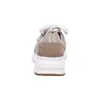A back view of a beige and white sneaker. Produktbild-Vorschau