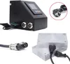 A collage of images showing a black control box with a screen and buttons, a power plug, and two silver heating plates with cables. Podgląd zdjęcia produktu