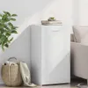A white sideboard is placed next to a sofa, with a basket of items and a plant nearby. Anteprima dell’immagine prodotto
