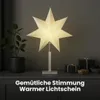 A star-shaped lamp is displayed on a dresser with gifts and a plant. Podgląd zdjęcia produktu