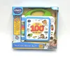 The image shows the retail packaging of a Vtech Baby "Mein 100-Wörter-Buch" educational toy. Voir les images du produit
