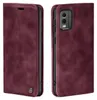 A burgundy flip case for a smartphone is shown from two angles, open and closed. Produktbild-Vorschau