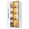 A white display cabinet with a glass door and LED lighting, showcasing various items inside. Náhled obrázku produktu