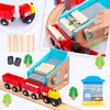 A collage of images showing a wooden toy train set with various accessories, including a sawmill, logs, coal, trees, and a station. Produktbild-Vorschau