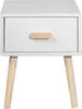 A white nightstand with a single drawer and wooden legs, shown against a white background. Podgląd zdjęcia produktu