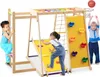 Children playing on a wooden indoor climbing frame with a slide, climbing wall, rope ladder, and basketball hoop. Podgląd zdjęcia produktu