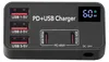 A black PD+USB charger with multiple ports and a digital display. Podgląd zdjęcia produktu