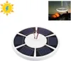 A solar-powered flag pole light is shown against a white background. A smaller inset image shows the light in use at a campsite. Produktbild-Vorschau