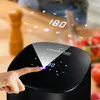 A hand is shown interacting with the digital display of a black air fryer. Anteprima dell’immagine prodotto