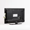 The back of a television with a DVD inserted into the side. Produktbild-Vorschau