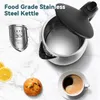 A stainless steel kettle is shown on a marble countertop, with a muffin, lemon slices, and a cup of coffee nearby. Produktbild-Vorschau