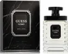 A product shot of Guess Uomo Eau de Toilette for men, featuring both the perfume bottle and its packaging. Voir les images du produit