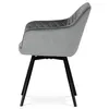 A side view of a gray velvet dining chair with black metal legs. Náhled obrázku produktu