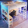 A loft bed with an integrated desk and gaming setup. Anteprima dell’immagine prodotto