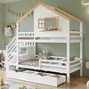 A white bunk bed with a house-shaped top and a window, set against a light green wall. Náhled obrázku produktu