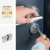 A collage showing a product award badge, a lock cylinder, and a person using a key to open a door. Produktbild-Vorschau