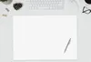 A blank sheet of paper with a pen on a desk with a keyboard and mouse. Náhľad obrázku produktu