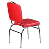A red diner chair with chrome legs on a white background. Produktbild-Vorschau