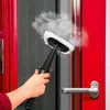 A hand is using a handheld steam cleaner to clean a red door frame and glass. Produktbild-Vorschau